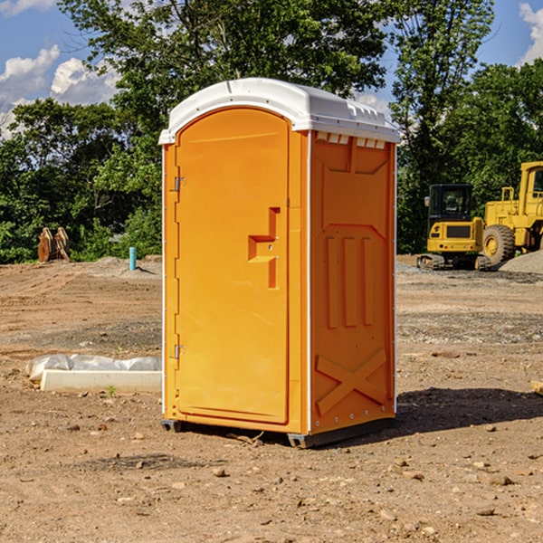 how often are the porta potties cleaned and serviced during a rental period in Henryville